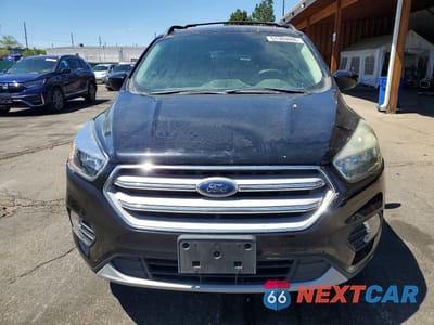 Piąte zdjęcie samochodu w środku: 2017 FORD ESCAPE SE VIN:1FMCU9G99HUB94196 - miniatura