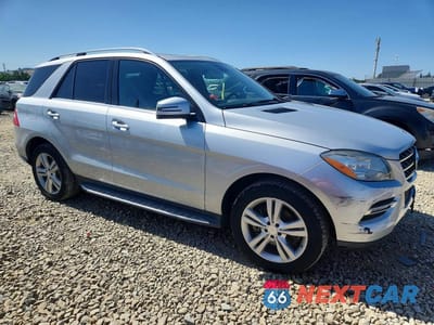 Czwarte zdjęcie samochodu z boku: 2014 MERCEDES-BENZ ML 350 VIN:4JGDA5JBXEA275447 - miniatura