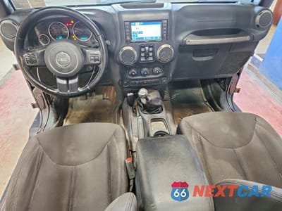 Zdjęcie 8 z 12 samochodu: 2016 JEEP WRANGLER UNLIMITED SPORT VIN:1C4BJWDG1GL266118 - miniatura