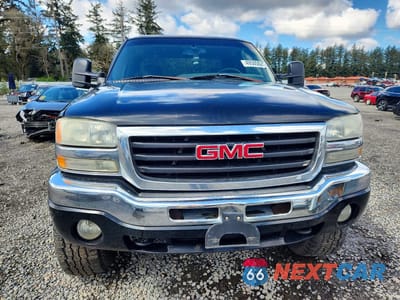 Piąte zdjęcie samochodu w środku: 2003 GMC NEW SIERRA K1500 VIN:1GTEK19T93E288563 - miniatura