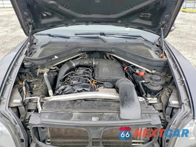 Zdjęcie 12 z 12 samochodu: 2013 BMW X5 XDRIVE35I VIN:5UXZV4C58D0B19381 - miniatura