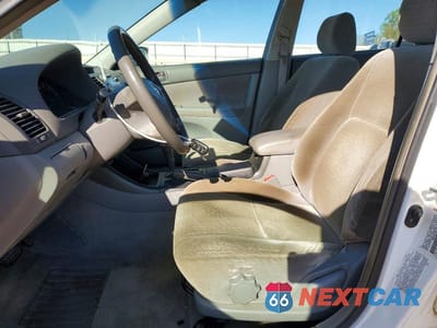 Zdjęcie 7 z 12 samochodu: 2003 TOYOTA CAMRY LE VIN:JTDBE32K430178119 - miniatura