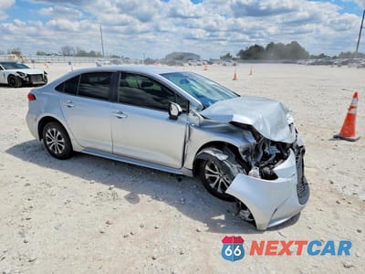 Czwarte zdjęcie samochodu z boku: 2022 TOYOTA COROLLA HYBRID LE VIN:JTDEAMDE4N3008625 - miniatura