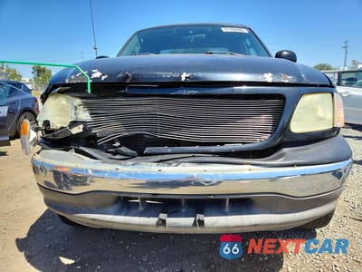 Piąte zdjęcie samochodu w środku: 2003 FORD F150 VIN:1FTRX17283NA89923 - miniatura