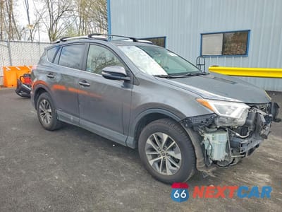 Czwarte zdjęcie samochodu z boku: 2016 TOYOTA RAV4 HYBRID XLE VIN:JTMRJREV5GD033169 - miniatura
