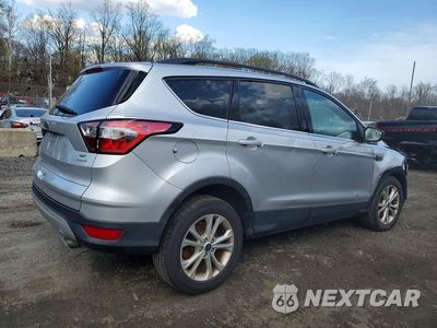 Trzecie zdjęcie samochodu z tyłu: 2018 FORD ESCAPE SE VIN:1FMCU0GD4JUC37073 - miniatura