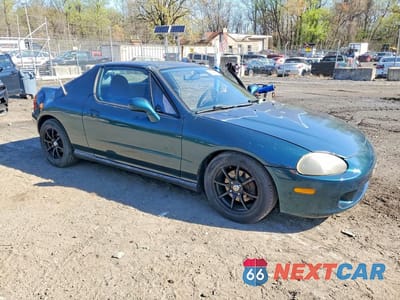 Czwarte zdjęcie samochodu z boku: 1997 HONDA CIVIC DEL SOL VIN:JHMEG2173VS000240 - miniatura