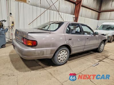 Trzecie zdjęcie samochodu z tyłu: 1995 TOYOTA CAMRY LE VIN:JT2SK12EXS0312579 - miniatura