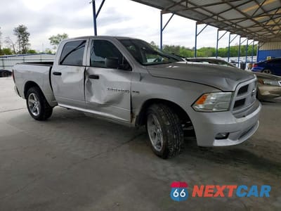 Czwarte zdjęcie samochodu z boku: 2012 DODGE RAM 1500 ST VIN:1C6RD6KT4CS332111 - miniatura