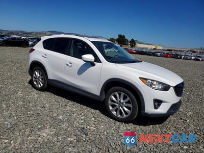 Czwarte zdjęcie samochodu z boku: 2015 MAZDA CX-5 GT VIN:JM3KE4DY7F0444333 - miniatura