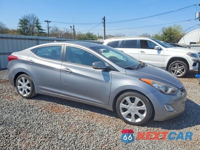 Czwarte zdjęcie samochodu z boku: 2012 HYUNDAI ELANTRA VIN:KMHDH4AE4CU454711 - miniatura