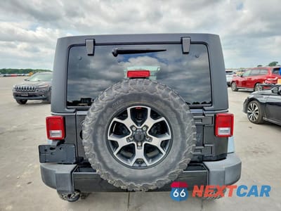 Zdjęcie 6 z 12 samochodu: 2016 JEEP WRANGLER UNLIMITED SPORT VIN:1C4BJWDG7GL103053 - miniatura