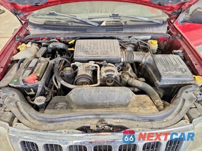 Zdjęcie 12 z 13 samochodu: 2002 JEEP GRAND CHEROKEE LAREDO VIN:1J4GW48N82C188976 - miniatura