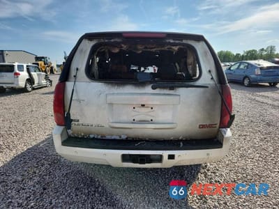 Zdjęcie 6 z 12 samochodu: 2011 GMC YUKON XL K1500 SLT VIN:1GKS2KE3XBR240970 - miniatura