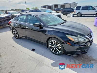 Czwarte zdjęcie samochodu z boku: 2016 NISSAN ALTIMA 2.5 SR VIN:1N4AL3AP6GN383003 - miniatura