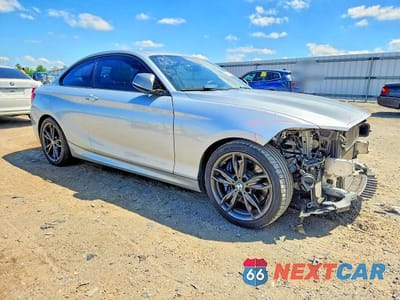 Czwarte zdjęcie samochodu z boku: 2016 BMW M235I VIN:WBA1J7C54GV360562 - miniatura