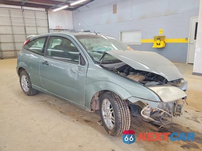 Czwarte zdjęcie samochodu z boku: 2005 FORD FOCUS ZX3 VIN:3FAFP31N85R112575 - miniatura