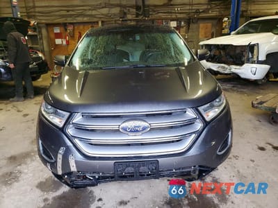 Piąte zdjęcie samochodu w środku: 2016 FORD EDGE TITANIUM VIN:2FMPK4K84GBB97004 - miniatura