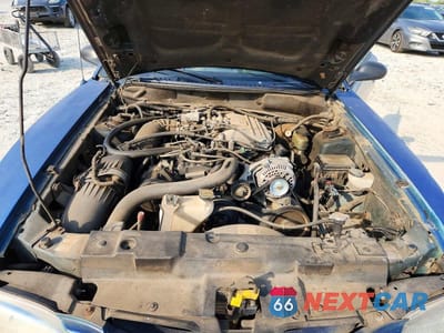 Zdjęcie 11 z 11 samochodu: 1997 FORD MUSTANG VIN:1FALP404XVF207704 - miniatura