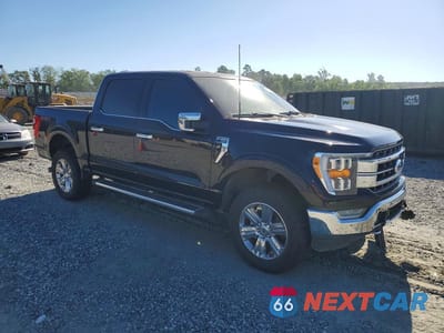 Czwarte zdjęcie samochodu z boku: 2023 FORD F150 SUPERCREW VIN:1FTFW1E89PKF92123 - miniatura