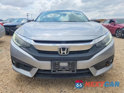 Piąte zdjęcie samochodu w środku: 2017 HONDA CIVIC TOURING VIN:19XFC1F9XHE000152 - miniatura