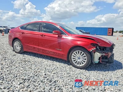 Czwarte zdjęcie samochodu z boku: 2016 FORD FUSION SE HYBRID VIN:3FA6P0LU5GR183819 - miniatura