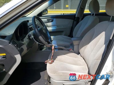 Zdjęcie 7 z 11 samochodu: 2010 KIA OPTIMA LX VIN:KNAGG4A84A5426703 - miniatura