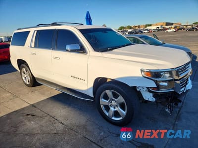 Czwarte zdjęcie samochodu z boku: 2015 CHEVROLET SUBURBAN K1500 LTZ VIN:1GNSKKKC8FR147622 - miniatura