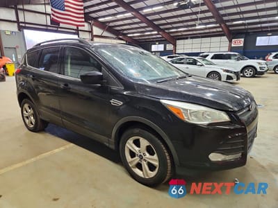 Czwarte zdjęcie samochodu z boku: 2016 FORD ESCAPE SE VIN:1FMCU9G95GUC70835 - miniatura