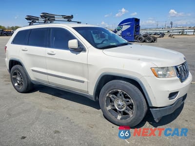 Czwarte zdjęcie samochodu z boku: 2011 JEEP GRAND CHEROKEE VIN:1J4RR4GG5BC720221 - miniatura