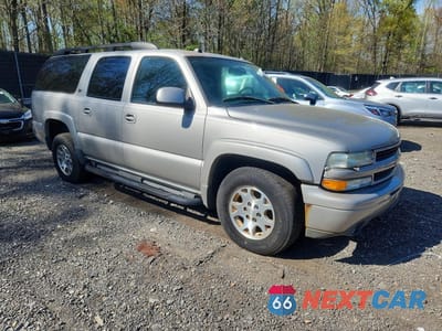Czwarte zdjęcie samochodu z boku: 2004 CHEV SUBURBAN K1500 VIN:3GNFK16Z84G310857 - miniatura