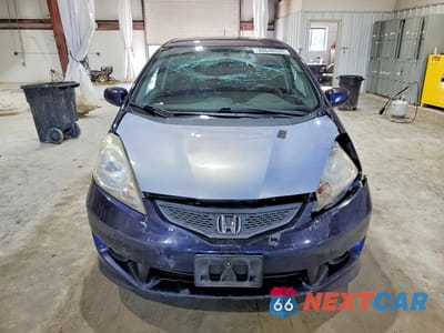 Piąte zdjęcie samochodu w środku: 2010 HONDA FIT SPORT VIN:JHMGE8H47AC029385 - miniatura