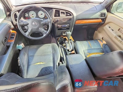 Zdjęcie 8 z 12 samochodu: 2003 NISSAN PATHFINDER SE VIN:JN8DR09X13W700106 - miniatura