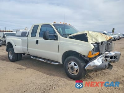 Czwarte zdjęcie samochodu z boku: 1999 FORD F350 SUPER DUTY VIN:1FTWX33F9XEA62386 - miniatura