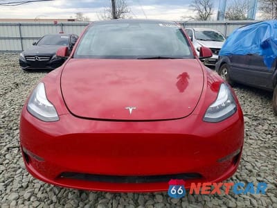 Piąte zdjęcie samochodu w środku: 2023 TESLA MODEL Y VIN:7SAYGAEE4PF615660 - miniatura