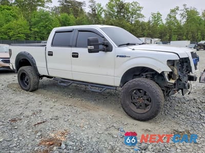 Czwarte zdjęcie samochodu z boku: 2014 FORD F150 SUPERCREW VIN:1FTFW1EF4EFC97984 - miniatura