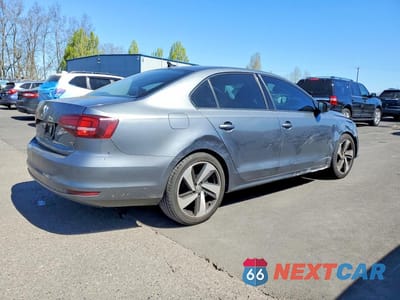 Trzecie zdjęcie samochodu z tyłu: 2016 VOLKSWAGEN JETTA S VIN:3VW267AJ6GM392753 - miniatura