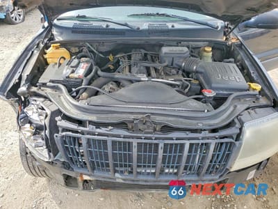 Zdjęcie 12 z 14 samochodu: 2004 JEEP GRAND CHEROKEE LAREDO VIN:1J4GW48S34C340980 - miniatura