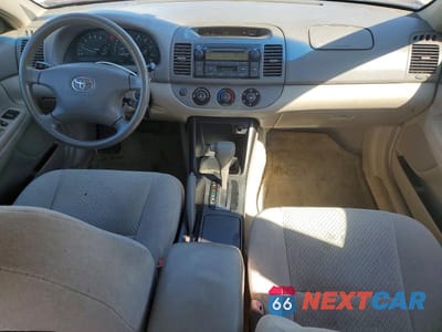 Zdjęcie 8 z 12 samochodu: 2004 TOYOTA CAMRY LE VIN:4T1BE32K64U264618 - miniatura
