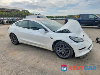 Czwarte zdjęcie samochodu z boku: 2019 TESLA MODEL 3 VIN:5YJ3E1EBXKF191588 - miniatura