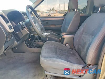 Zdjęcie 7 z 11 samochodu: 2001 NISSAN FRONTIER SC VIN:1N6MD26Y31C356647 - miniatura