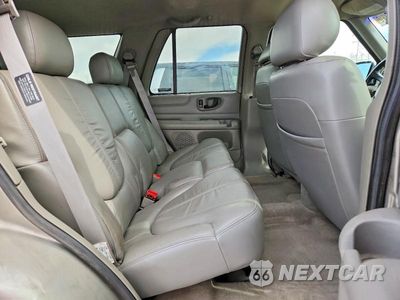Zdjęcie 11 z 14 samochodu: 1999 GMC JIMMY VIN:1GKDT13WXX2549416 - miniatura