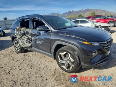 Czwarte zdjęcie samochodu z boku: 2023 HYUNDAI TUCSON VIN:5NMJECAE8PH218652 - miniatura