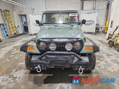 Piąte zdjęcie samochodu w środku: 2000 JEEP WRANGLER / TJ SPORT VIN:1J4FA49SXYP712676 - miniatura