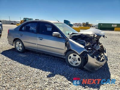 Czwarte zdjęcie samochodu z boku: 2005 HONDA CIVIC HYBRID VIN:JHMES956X5S016394 - miniatura