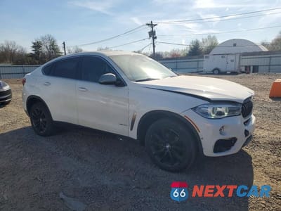Czwarte zdjęcie samochodu z boku: 2019 BMW X6 XDRIVE35I VIN:5UXKU2C56K0Z64118 - miniatura