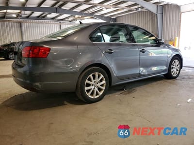 Trzecie zdjęcie samochodu z tyłu: 2012 VOLKSWAGEN JETTA VIN:3VWBP7AJ4DM449069 - miniatura