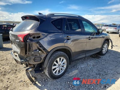 Trzecie zdjęcie samochodu z tyłu: 2016 MAZDA CX-5 TOURING VIN:JM3KE4CY9G0866770 - miniatura