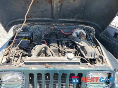 Zdjęcie 11 z 12 samochodu: 1994 JEEP WRANGLER / YJ SAHARA VIN:1J4FY49S0RP459073 - miniatura