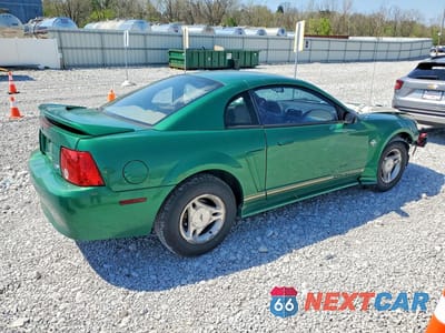 Trzecie zdjęcie samochodu z tyłu: 1999 FORD MUSTANG VIN:1FAFP4041XF190923 - miniatura